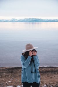 Preview wallpaper girl, camera, hat, photographer, nature