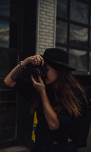 Preview wallpaper girl, camera, hat, photographer, tattoo