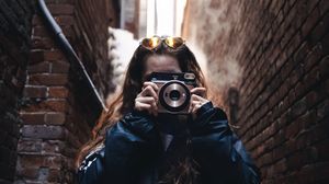 Preview wallpaper girl, camera, lens, glasses
