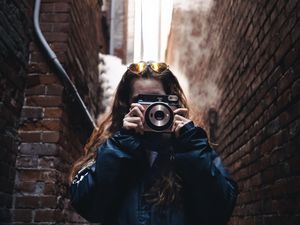 Preview wallpaper girl, camera, lens, glasses