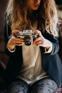 Preview wallpaper girl, camera, photographer, objective, hands