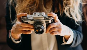 Preview wallpaper girl, camera, photographer, objective, hands