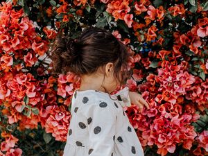 Preview wallpaper girl, child, flowers, bright