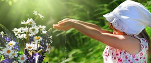 Preview wallpaper girl, child, flowers, bucket, water