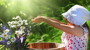 Preview wallpaper girl, child, flowers, bucket, water