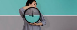 Preview wallpaper girl, clock, wall, symmetry, minimalism