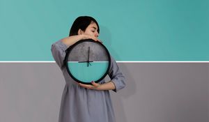 Preview wallpaper girl, clock, wall, symmetry, minimalism