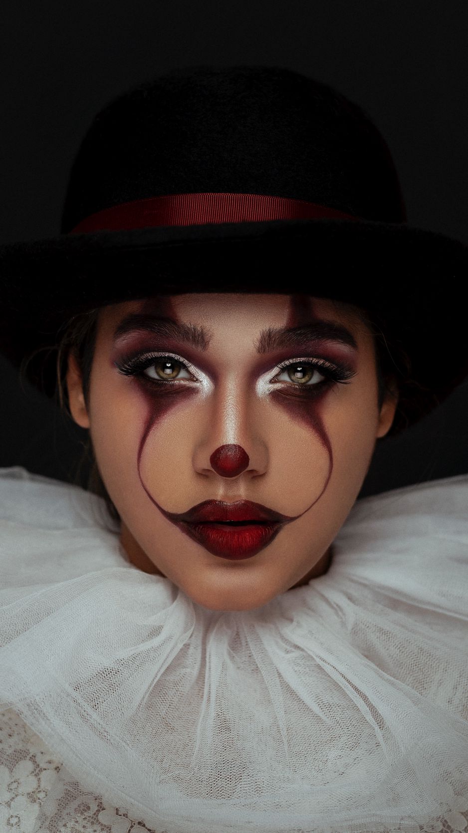 938x1668 Wallpaper girl, clown, face, paint, makeup