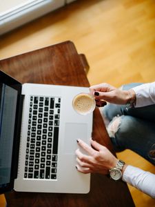 Preview wallpaper girl, coffee, cup, hands, laptop