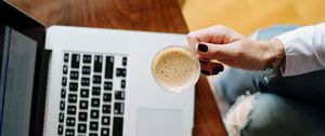 Preview wallpaper girl, coffee, cup, hands, laptop