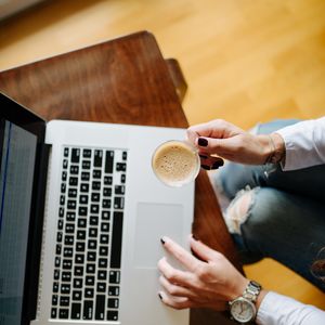 Preview wallpaper girl, coffee, cup, hands, laptop