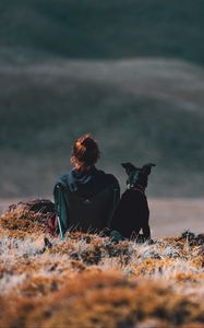 Preview wallpaper girl, dog, friends, mountains, trip