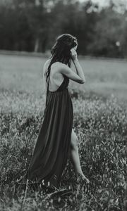 Preview wallpaper girl, dress, bw, field, blur, loneliness