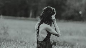 Preview wallpaper girl, dress, bw, field, blur, loneliness