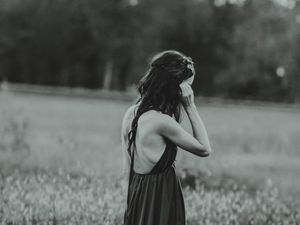 Preview wallpaper girl, dress, bw, field, blur, loneliness