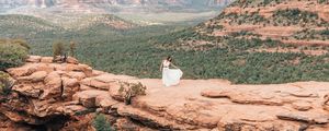 Preview wallpaper girl, dress, canyon, cliff, valley