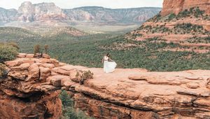 Preview wallpaper girl, dress, canyon, cliff, valley