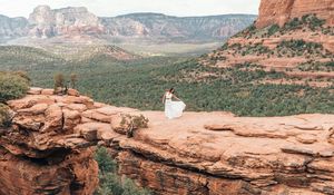 Preview wallpaper girl, dress, canyon, cliff, valley