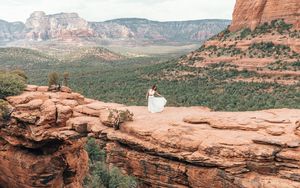 Preview wallpaper girl, dress, canyon, cliff, valley