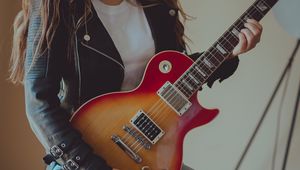 Preview wallpaper girl, electric guitar, guitar, musician, music