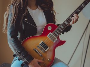 Preview wallpaper girl, electric guitar, guitar, musician, music