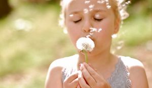 Preview wallpaper girl, face, dandelion, flower, stem