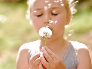 Preview wallpaper girl, face, dandelion, flower, stem