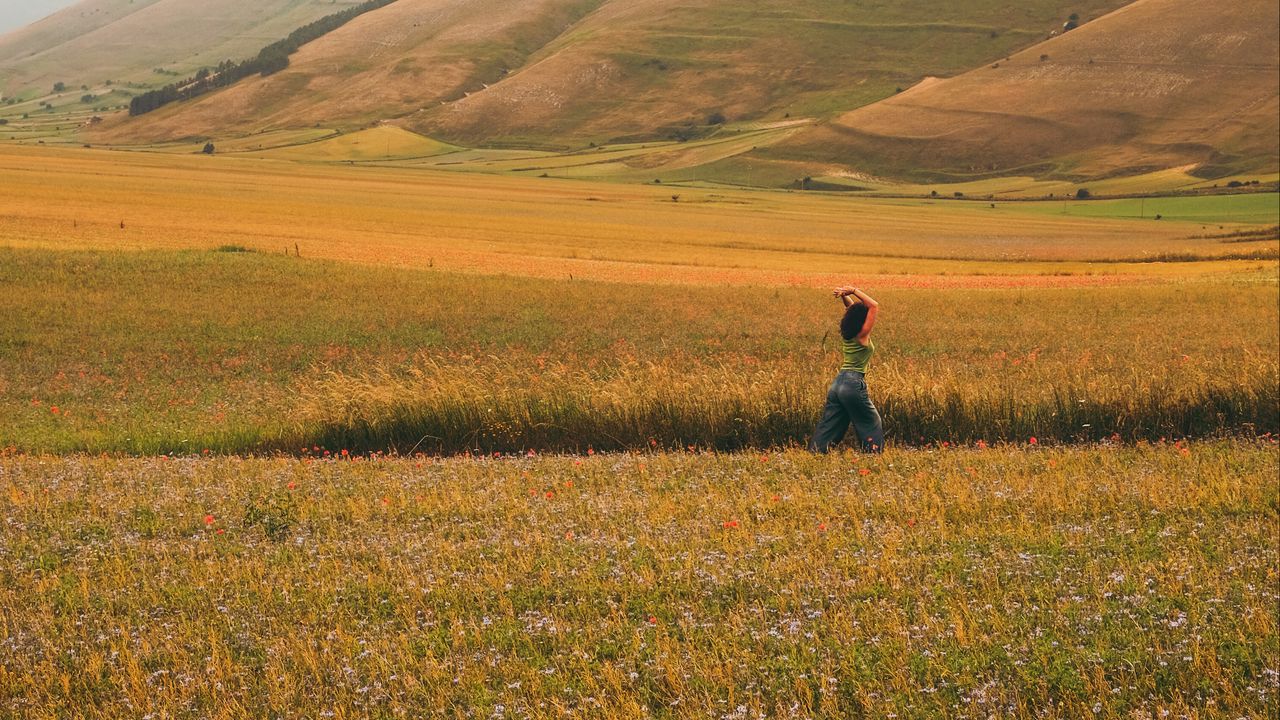 Wallpaper girl, field, hills, grass, flowers