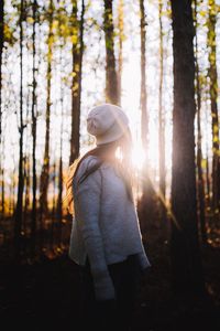 Preview wallpaper girl, forest, sunlight, trees, glare