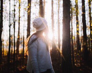 Preview wallpaper girl, forest, sunlight, trees, glare
