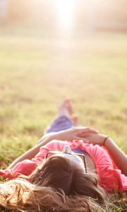 Preview wallpaper girl, grass, nature, rest, sunshine