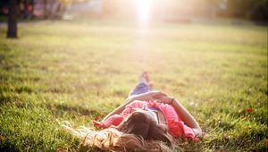 Preview wallpaper girl, grass, nature, rest, sunshine