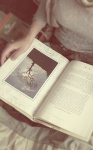 Preview wallpaper girl, hand, books, mood, blurring