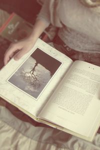 Preview wallpaper girl, hand, books, mood, blurring