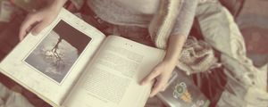 Preview wallpaper girl, hand, books, mood, blurring