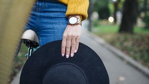 Preview wallpaper girl, hand, hat, bike