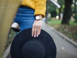 Preview wallpaper girl, hand, hat, bike