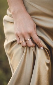 Preview wallpaper girl, hand, rings, dress