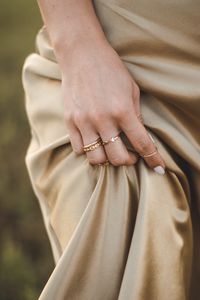 Preview wallpaper girl, hand, rings, dress