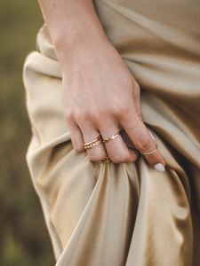 Preview wallpaper girl, hand, rings, dress