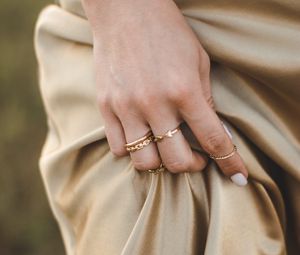 Preview wallpaper girl, hand, rings, dress