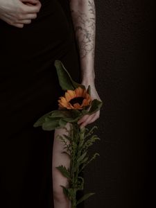 Preview wallpaper girl, hand, sunflower, flower, tattoo