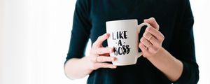 Preview wallpaper girl, hands, cup, inscription