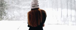 Preview wallpaper girl, hat, hair, snow, winter
