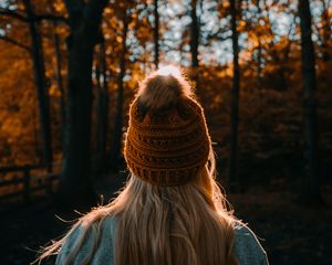 Preview wallpaper girl, hat, hair, forest, rays