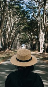 Preview wallpaper girl, hat, road, trees, aesthetics