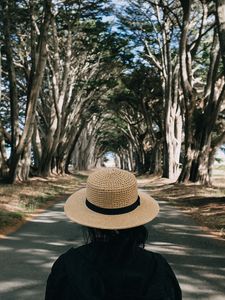 Preview wallpaper girl, hat, road, trees, aesthetics