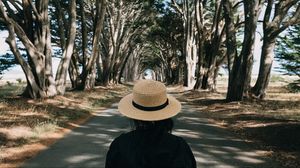 Preview wallpaper girl, hat, road, trees, aesthetics