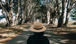 Preview wallpaper girl, hat, road, trees, aesthetics