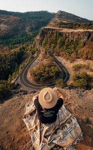 Preview wallpaper girl, hat, view, back, road, rocks